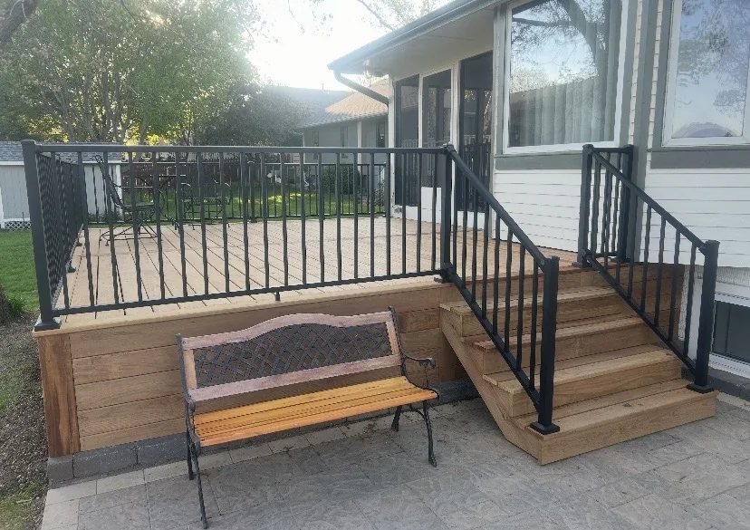 Deck and stair connection with matching wood skirting