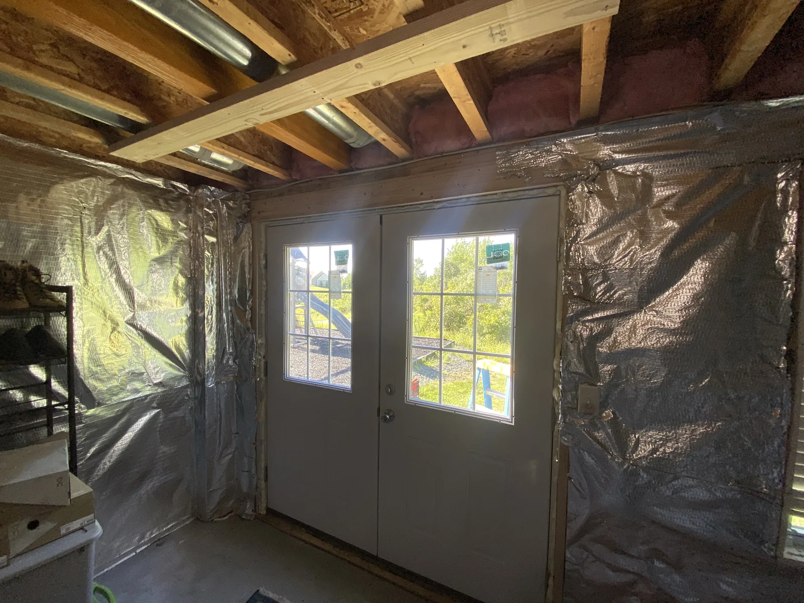 Interior framing and insulation around an exterior door