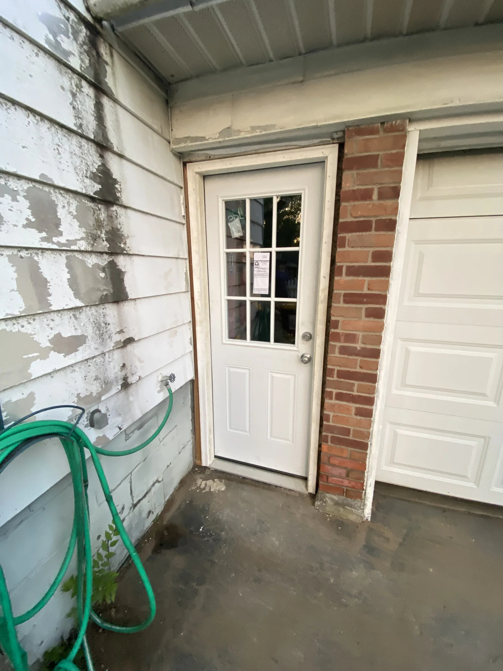 White glazed exterior door and surrounding trim
